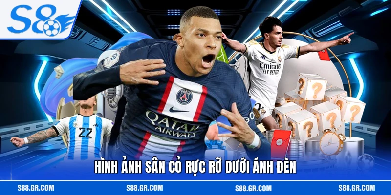 Hình ảnh sân cỏ rực rỡ dưới ánh đèn